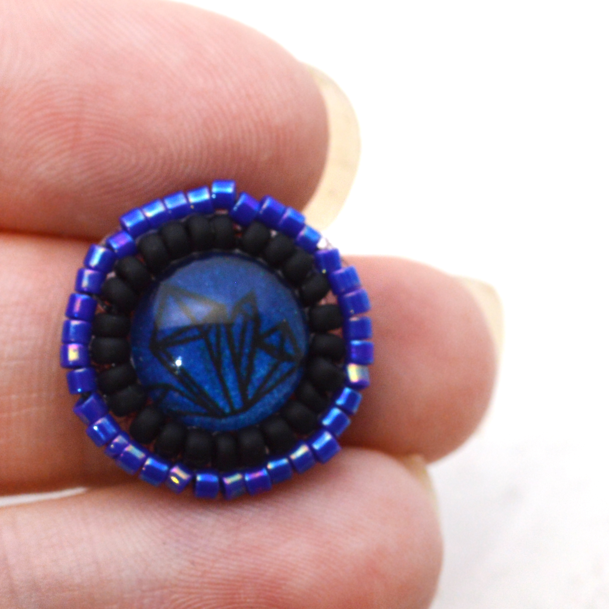 blue and black crystals magic bindi
